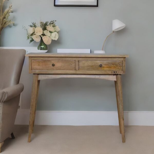 Handcrafted console table made from solid mango wood with two drawers, brass knobs, and a natural oak finish, designed for home décor