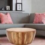 Handcrafted solid mango wood drum coffee table, perfect for any living room.