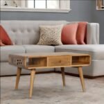 Modern pine finish coffee table with curved edges, featuring two drawers and open slots for storage.