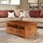 Jodhpur Wood coffee table made of solid wood with storage drawers and shelf, perfect for a cozy living room.