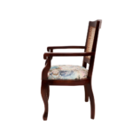 Side view of a handcrafted Wooden Royal Cane Arm Chair made from solid hardwood with a dark light finish and natural cane backrest.