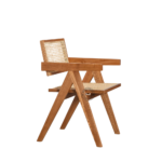 Side view of Rene Cane Dining Chair showing armrests, cushioned seat, and cane woven back