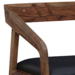 Side view of Premium Solid Sheesham Wood Arm Chair with rustic stain finish, leather cushioned seat, and sturdy wooden armrests and legs.