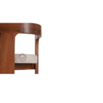 Close-up of Praise Dining Chair With Arm highlighting barrel back, armrest detailing, and slim padded seat craftsmanship.