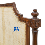 Close-up of Aaranya Cane Sheesham Wood Bed showing hand-woven cane headboard texture and detailed Sheesham wood finish