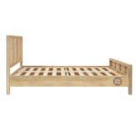 Side view of Stacy Cane Mango Wood Bed Frame showing solid mango wood frame and woven cane headboard handcrafted in India