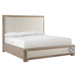 Side view of Neevi Panel King Bed showing upholstered headboard, low footboard, and Marcona wood finish