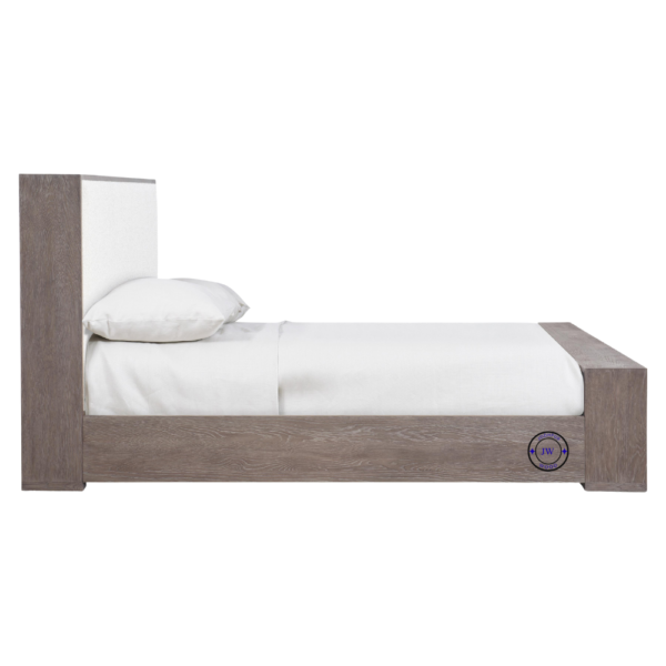 Side view of Prisha Panel King Bed in Light Blacky Finish showing low footboard and upholstered headboard panels