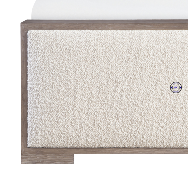 Close-up of Prisha Panel King Bed showing detailed upholstered panels and Light Blacky Finish on wooden frame
