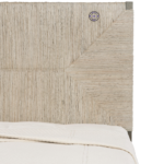 Close-up of Alia Panel King Bed showing detailed woven abaca panels and Rustic Grey oak wood texture