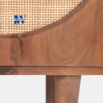 Close-up of Vanya Mango Wood & Cane Cabinet showing cane texture and wood grain
