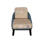 Floral upholstered lounge chair front view with wooden legs and cushioned seating