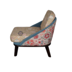 Side view of upholstered lounge chair with curved armrests and wooden legs