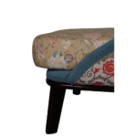 Close-up of floral fabric upholstery on lounge chair with soft cushioning