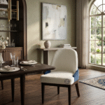 Ivory Bouclé Crescent Chair placed in a modern dining room setting front view