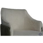 Close-up of ivory Bouclé fabric texture on luxury accent chair showing detailed looped upholstery