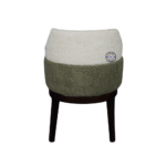 Back view of luxury Bouclé accent chair showing curved outer shell and upholstered design